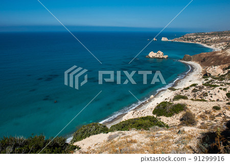 Petra tou Roumiou, Aphrodite's rock. Rocky coastline on the Mediterranean sea in Cyprus. Petra tou Roumiou, Aphrodite's rock. Rocky coastline on the Mediterranean sea in Cyprus. 91299916