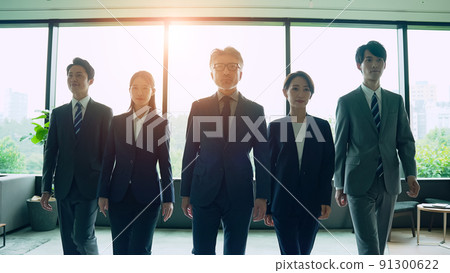 A wide range of business groups walking side by side 91300622