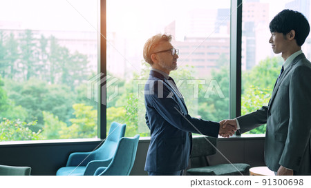 Executive man shaking hands Executive man shaking hands 91300698