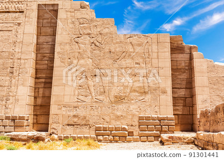Ancient carvings on the wall of the Karnak Temple, 7 pylon view, Luxor, Egypt 91301441
