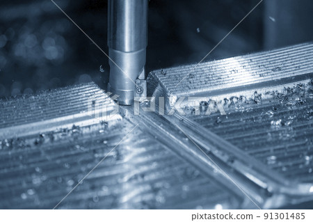 Close up scene the CNC milling machine rough cutting the injection mold parts by indexable tools. Close up scene the CNC milling machine rough cutting the injection mold parts by indexable tools. 91301485
