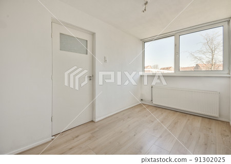 Interior of empty white room with large balcony windows with wooden parquet floor Interior of empty white room with large balcony windows with wooden parquet floor 91302025