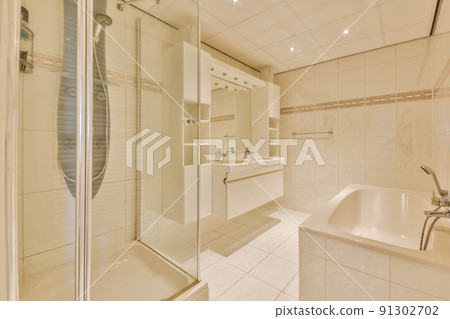 Interior of contemporary bathroom with shower and sink in minimal style in flat Interior of contemporary bathroom with shower and sink in minimal style in flat 91302702