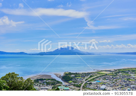 Sakurajima and Kirishima cityscape seen from Kirishima Children's Hall 91305578