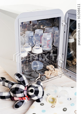 sanitizing the baby things in UV Sterilizer 91306611