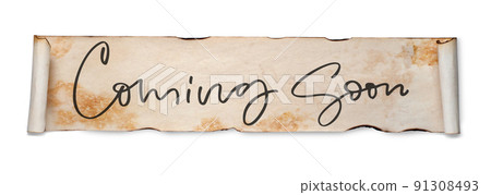 Coming soon. Handwritten inscription on a scroll of old paper. Isolated on white Coming soon. Handwritten inscription on a scroll of old paper. Isolated on white 91308493