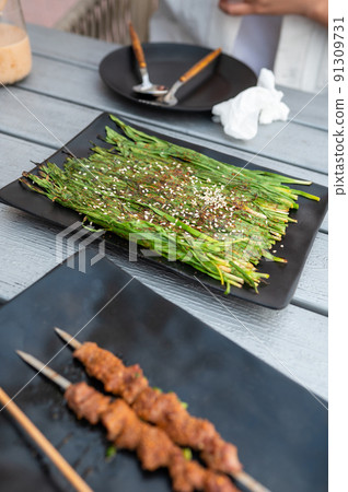 Chinese vegetable and beef barbeque on a plate 91309731