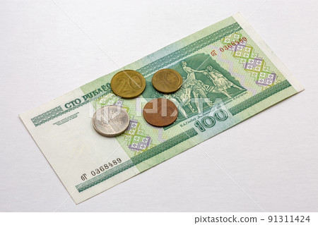 Belarusian paper money banknote and coins closeup Belarusian paper money banknote and coins closeup 91311424