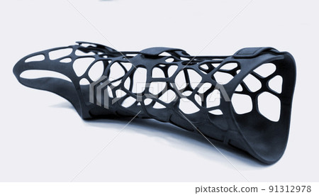 Medical orthopedic plastic prosthesis printed on powder 3D printer isolated on white background. Gypsum close-up. Multi Jet Fusion MJF 3Dprinting technology. New modern progressive additive technology Medical orthopedic plastic prosthesis printed on powder 3D printer isolated on white background. Gypsum close-up. Multi Jet Fusion MJF 3Dprinting technology. New modern progressive additive technology 91312978