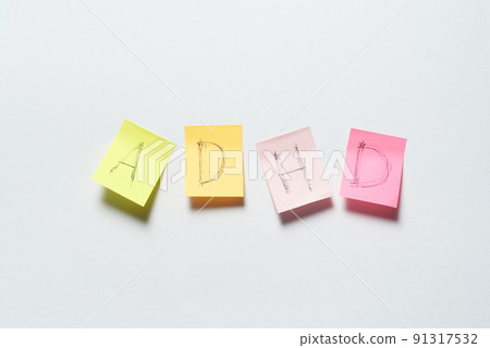 ADHD written on sticky notes. 91317532