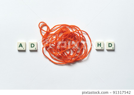 ADHD formed of scrabble blocks with tangled thread. ADHD formed of scrabble blocks with tangled thread. 91317542