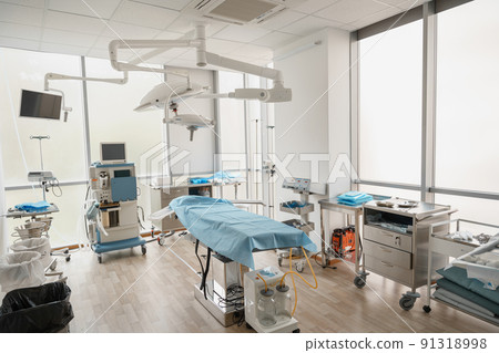 Interior of operation room with different medical equipment ready for surgery 91318998