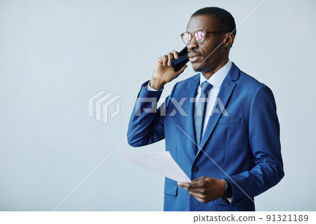 Business Manager Speaking on Phone Minimal 91321189