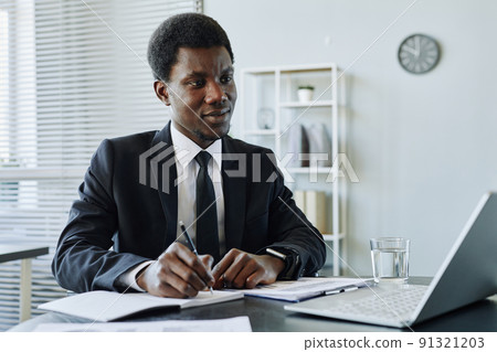 Young Black Businessman Working Young Black Businessman Working 91321203