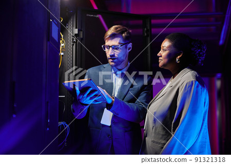 Two Technicians in Server Room Two Technicians in Server Room 91321318
