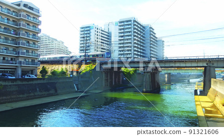 JR Kobe Line A train that crosses the river [horizontal composition] 91321606