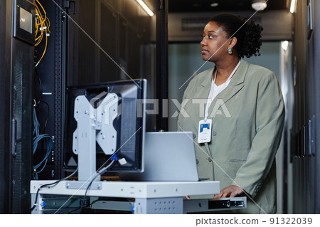 Black Young Woman in Server Room 91322039