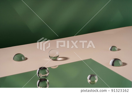 Green backdrop with transparent sphere decor, display mockup. Cosmetic background podium for product presentation. Showcase mock up for perfume advertising 91323162