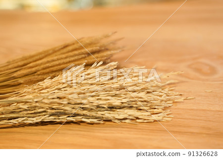 Close up wheat on wood table. Close up wheat on wood table. 91326628