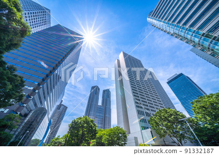 Tokyo cityscape in Japan 3 consecutive hot days, June, but Shinjuku subcenter like midsummer. Tokyo Metropolitan Government in the back = 27th 91332187