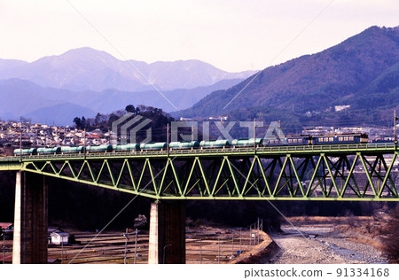 1999 EF64 double-headed tank freight train going on the Chuo East Line 91334168