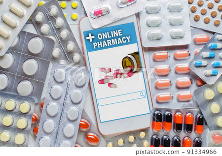 Online pharmacy. Application in your smartphone for online ordering of medicines. Lots of pills. The concept of convenient choice of medicines Online pharmacy. Application in your smartphone for online ordering of medicines. Lots of pills. The concept of convenient choice of medicines 91334966