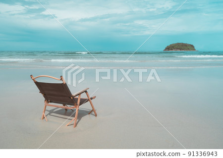 Tropical nature clean beach and white sand in summer with sun light blue sky and bokeh. 91336943