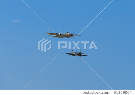 B-25J F4U-4 Corsair carrier-capable fighter escorting Mitchell bomber 91339064