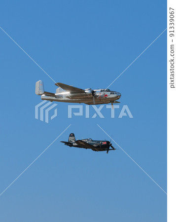 B-25J F4U-4 Corsair carrier-capable fighter escorting Mitchell bomber B-25J F4U-4 Corsair carrier-capable fighter escorting Mitchell bomber 91339067