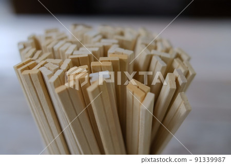 Disposable chopsticks at a restaurant Disposable chopsticks at a restaurant 91339987