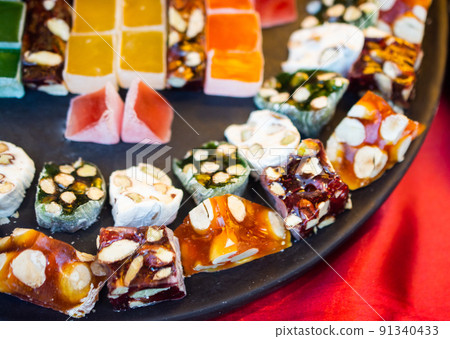 Traditional Turkish delight sweets as lokum candy Traditional Turkish delight sweets as lokum candy 91340433