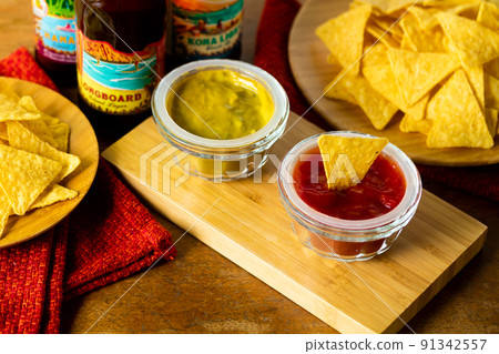 Tortilla chips and dip sauce 91342557