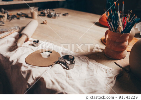 Pottery creative mess on the table. Pottery creative mess on the table. 91343229