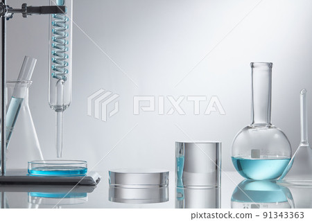 Product research and production of centella asiatica in a laboratory with medical devices on a white background. Blank label bottles for design 91343363
