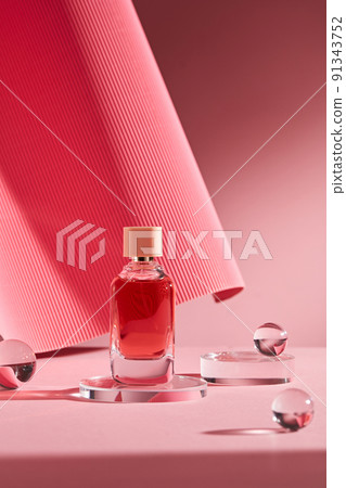 Abstract background for branding and minimal presentation. Glass podium on folding paper pleated geometric pink background. Abstract background for branding and minimal presentation. Glass podium on folding paper pleated geometric pink background. 91343752