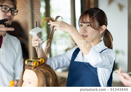 Young staff and teachers practicing perms Young staff and teachers practicing perms 91343849