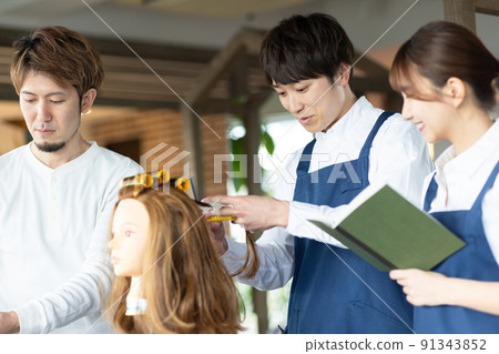 Young staff and teachers practicing perms Young staff and teachers practicing perms 91343852