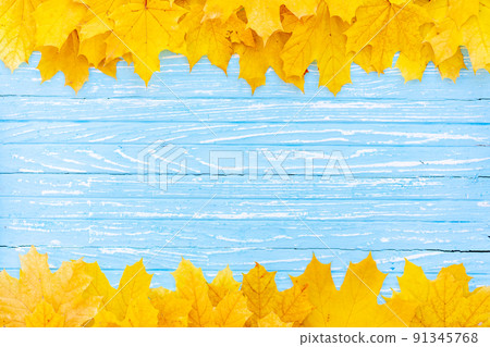 Autumn leaves frame on wooden background top view Fall Border yellow and Orange Leaves vintage wood table Copy space for text. Autumn leaves frame on wooden background top view Fall Border yellow and Orange Leaves vintage wood table Copy space for text. 91345768