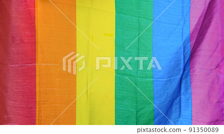 LGBT rainbow flag. Concept of the Pride month, freedom, love. Top view LGBT rainbow flag. Concept of the Pride month, freedom, love. Top view 91350089