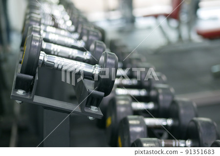 Dumbbell, barbell in the gym with copy space . 91351683