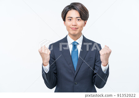 Young suit man guts pose 91352022
