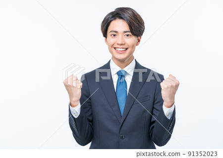 Young suit man guts pose 91352023