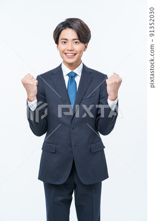 Young suit man guts pose 91352030