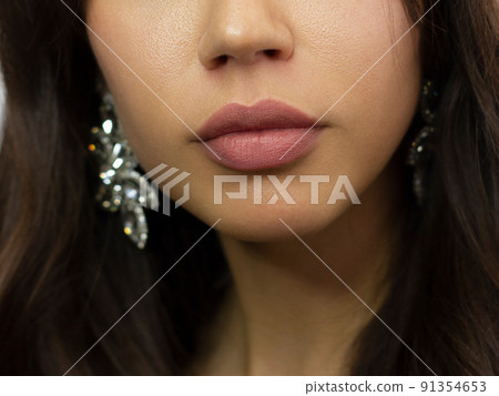 Closeup plump Lips. Lip Care, Augmentation, Fillers. Macro photo with Face detail. Natural shape with perfect contour. Close-up perfect natural lip makeup beautiful female mouth. Plump sexy full lips Closeup plump Lips. Lip Care, Augmentation, Fillers. Macro photo with Face detail. Natural shape with perfect contour. Close-up perfect natural lip makeup beautiful female mouth. Plump sexy full lips 91354653