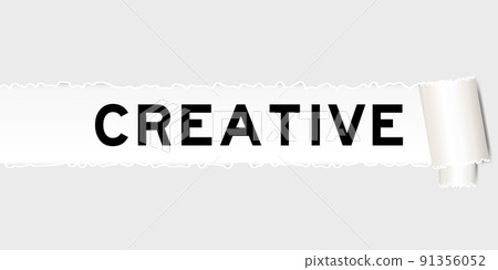 Ripped gray paper background that have word creative under torn part 91356052