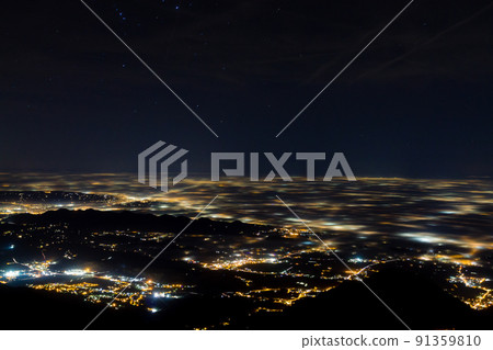 Plain illuminated partially covered by fog, soft lights Plain illuminated partially covered by fog, soft lights 91359810