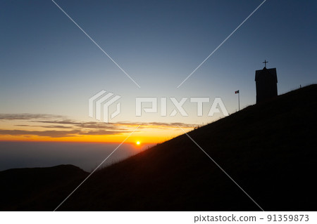 Dawn at the little church, mount Grappa landscape, Italy 91359873