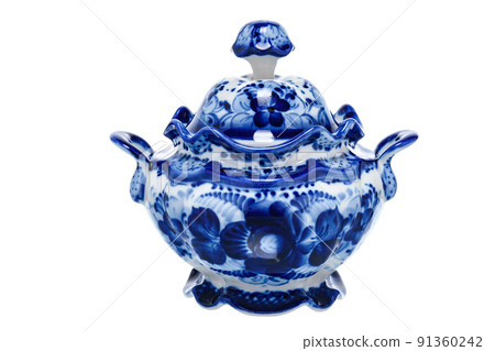 Tableware Empty Sugar Bowl Casket Figurine Sculpture Porcelain Ceramic Isolated on white background. Cobalt Blue color is traditional folk floral painting. Decor for interior of premises. Tableware Empty Sugar Bowl Casket Figurine Sculpture Porcelain Ceramic Isolated on white background. Cobalt Blue color is traditional folk floral painting. Decor for interior of premises. 91360242