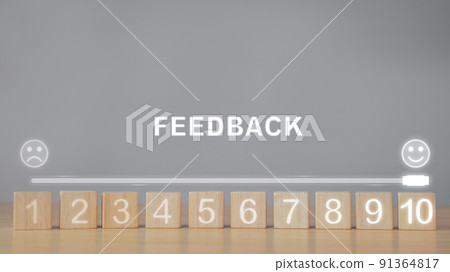 Evaluation and satisfaction concept. Feedback level from 1 to 10. Close up shot on wood blocks with copy space. 91364817
