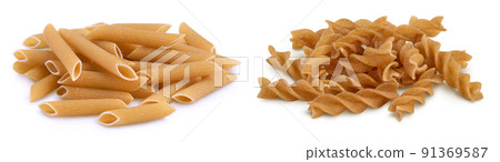 Wholegrain penne and fusilli pasta from durum wheat isolated on white background with clipping path and full depth of field. Wholegrain penne and fusilli pasta from durum wheat isolated on white background with clipping path and full depth of field. 91369587